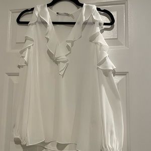 Alice and Olivia cold shoulder shirt!